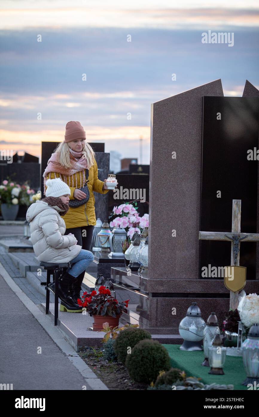 Visiting the grave of a cherished loved one at dusk can be a deeply ...