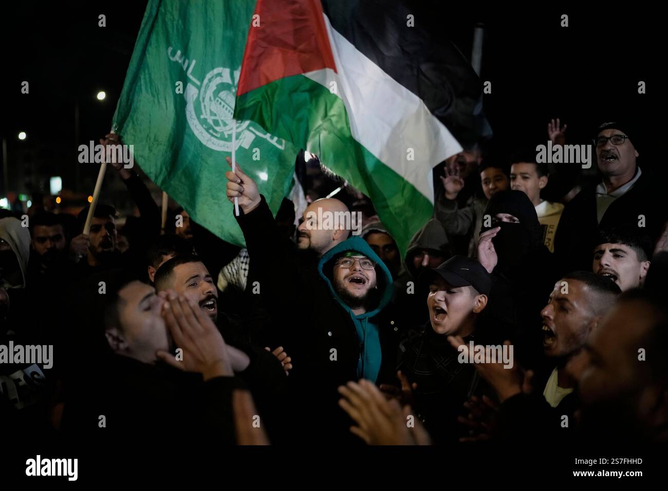 Palestinians celebrate a ceasefire agreement between Hamas and Israel ...