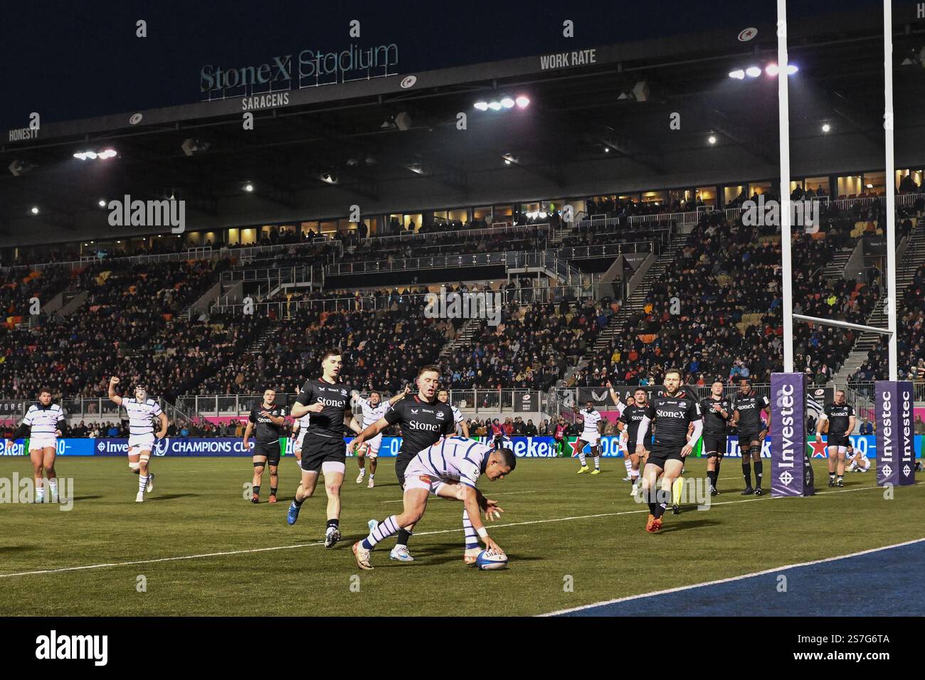 Adrien Seguret of Castres Olympique runs in the final try of the