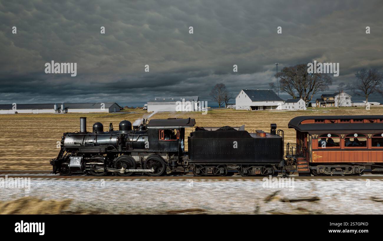A classic steam locomotive chugs along a railway track, passing vast ...