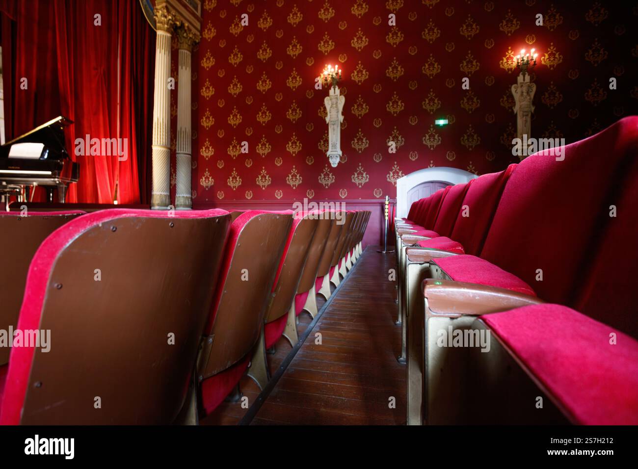 Elegant vintage theater interior with red seats and ornate decor Stock ...