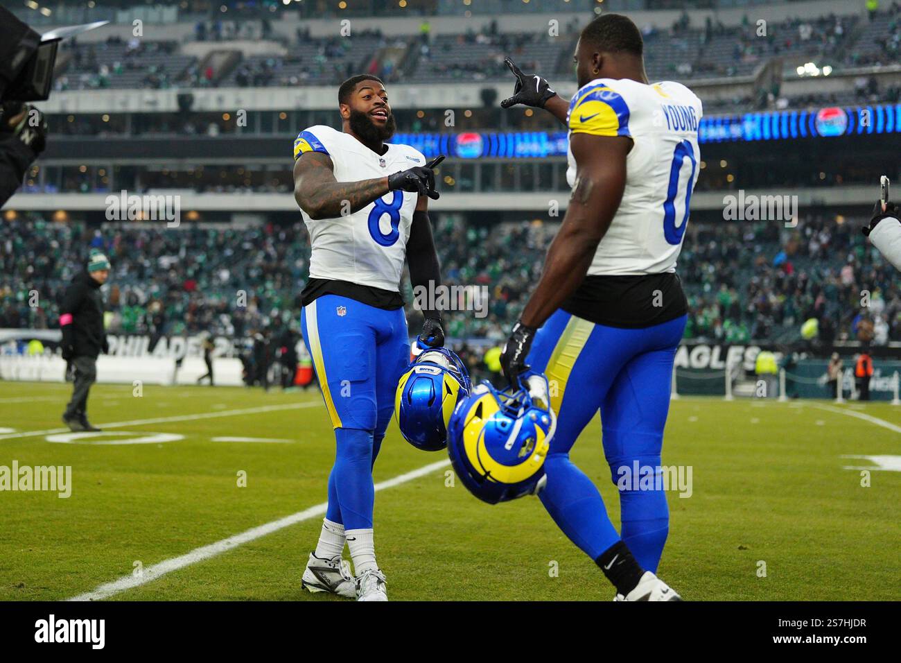 Los Angeles Rams linebacker Jared Verse (8) and Rams linebacker Byron ...
