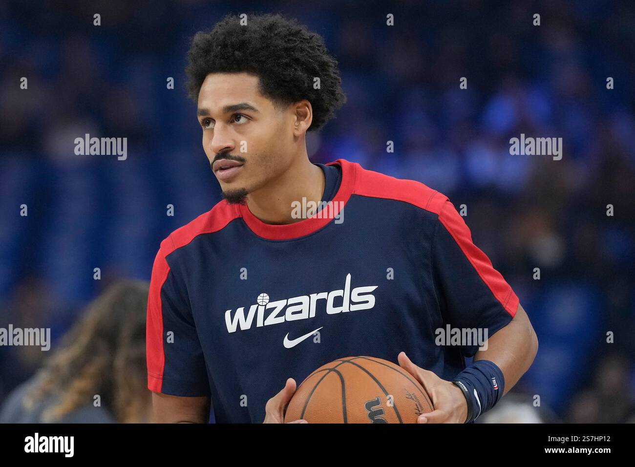 Washington Wizards guard Jordan Poole warms up before an NBA basketball