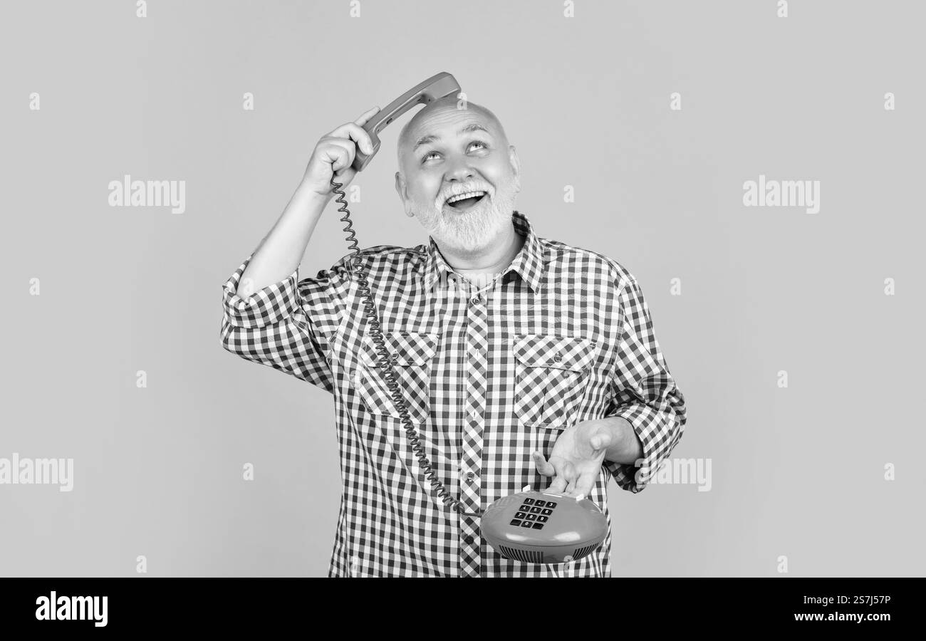 Happy Old Man With Retro Telephone On Yellow Background Stock Photo Alamy happy-old-man-with-retro-telephone-on-yellow-background-stock-photo-alamy