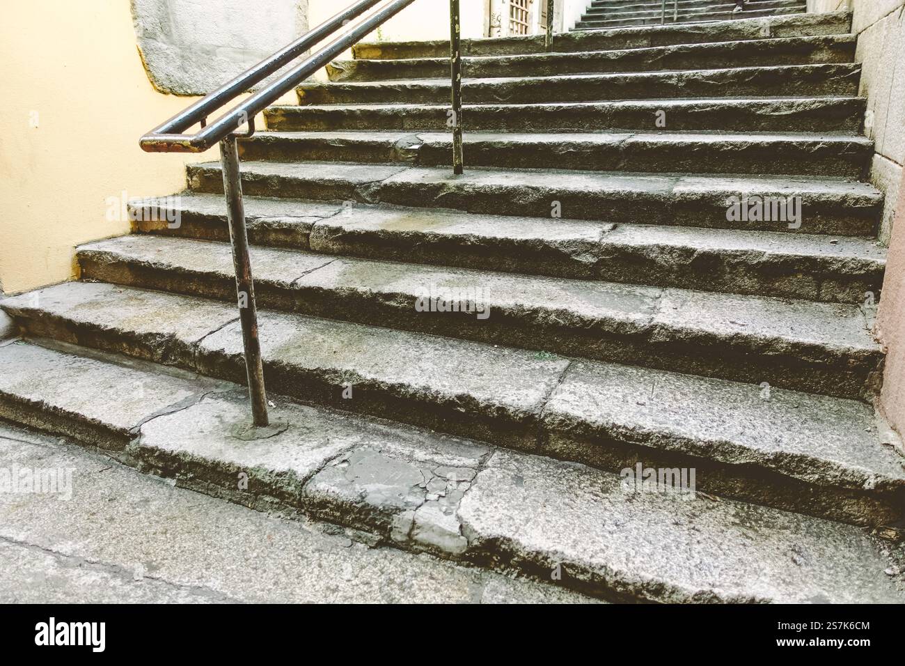 A narrow and steep staircase located in Porto, Portugal, designed for ...
