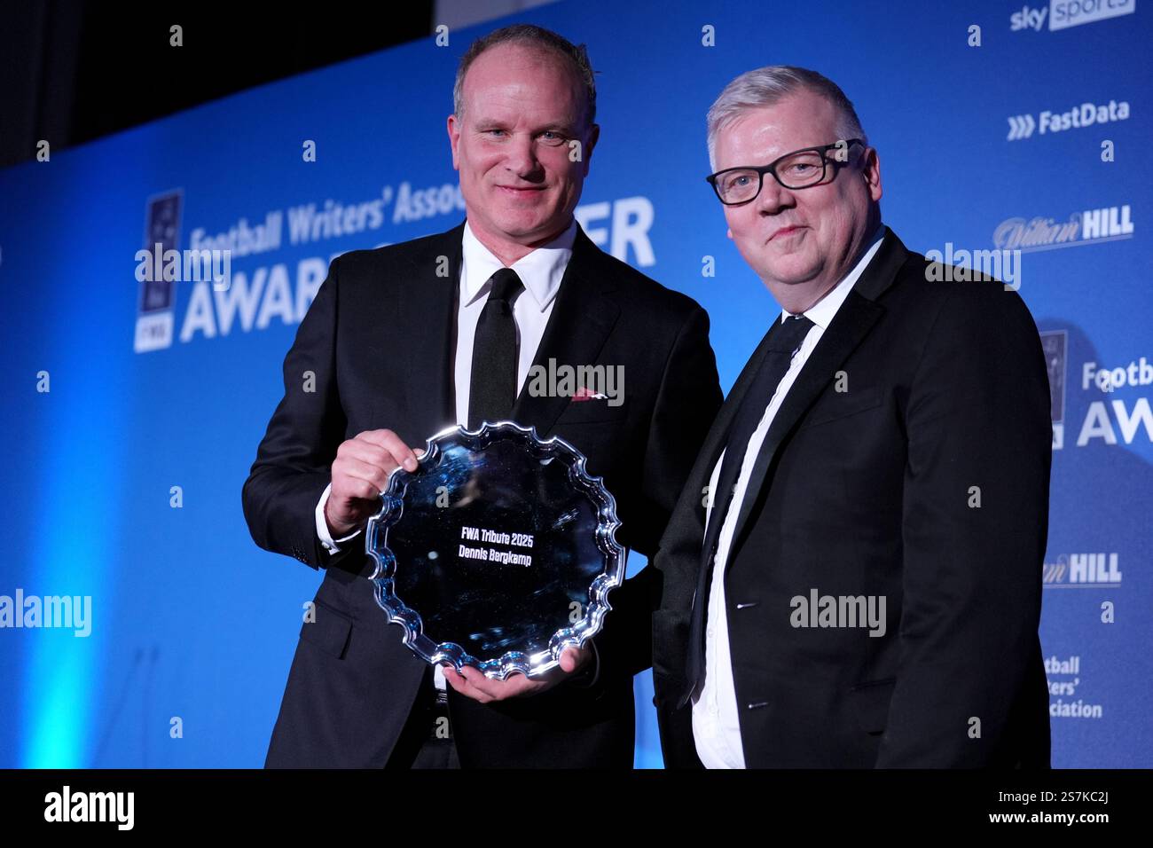 Dennis Bergkamp (left) with his award alongside FWA Chairman John Cross