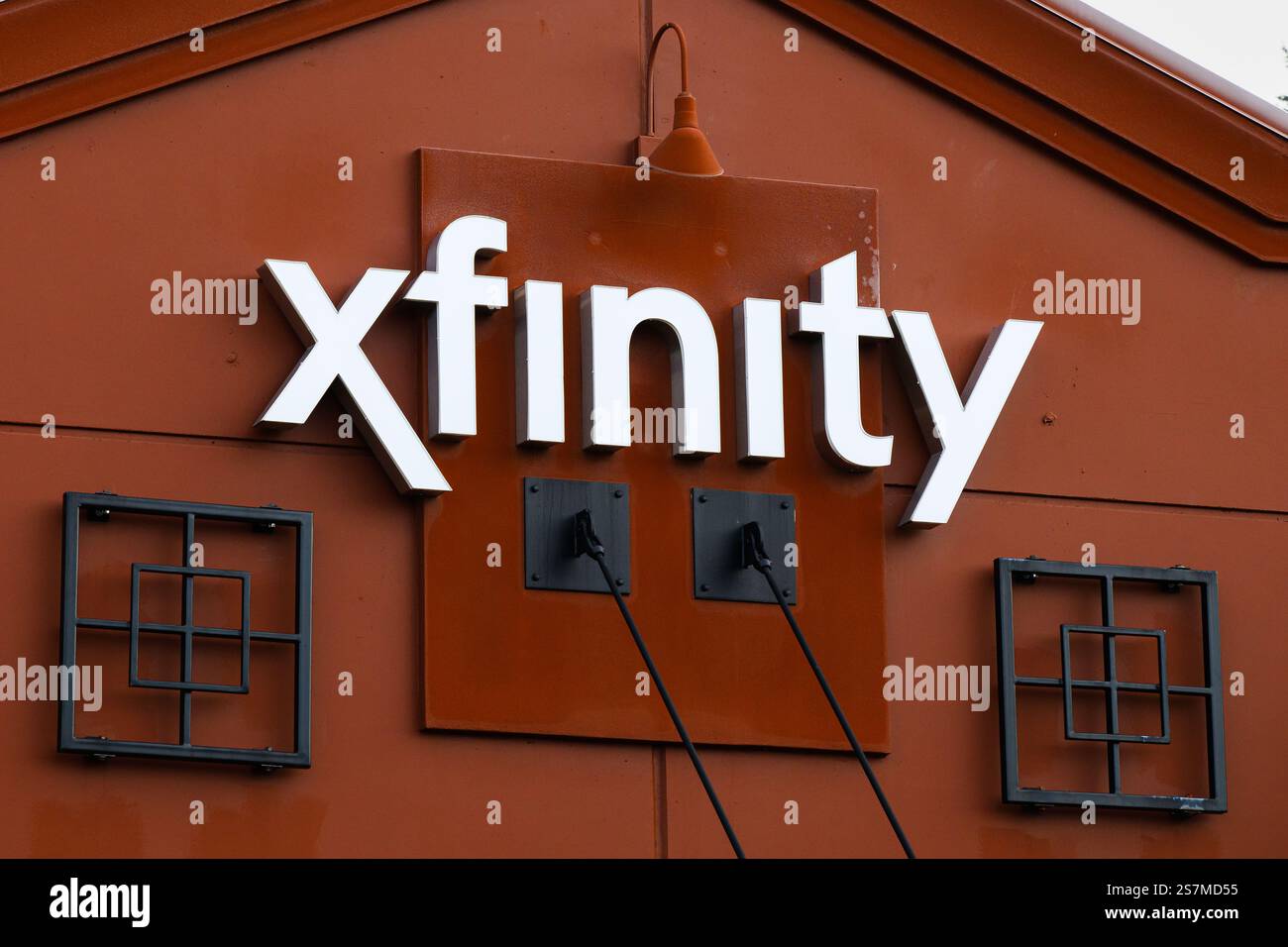 Redmond, WA, USA - January 18, 2025; Xfinity sign in closeup on building brand of Comcast Stock Photo