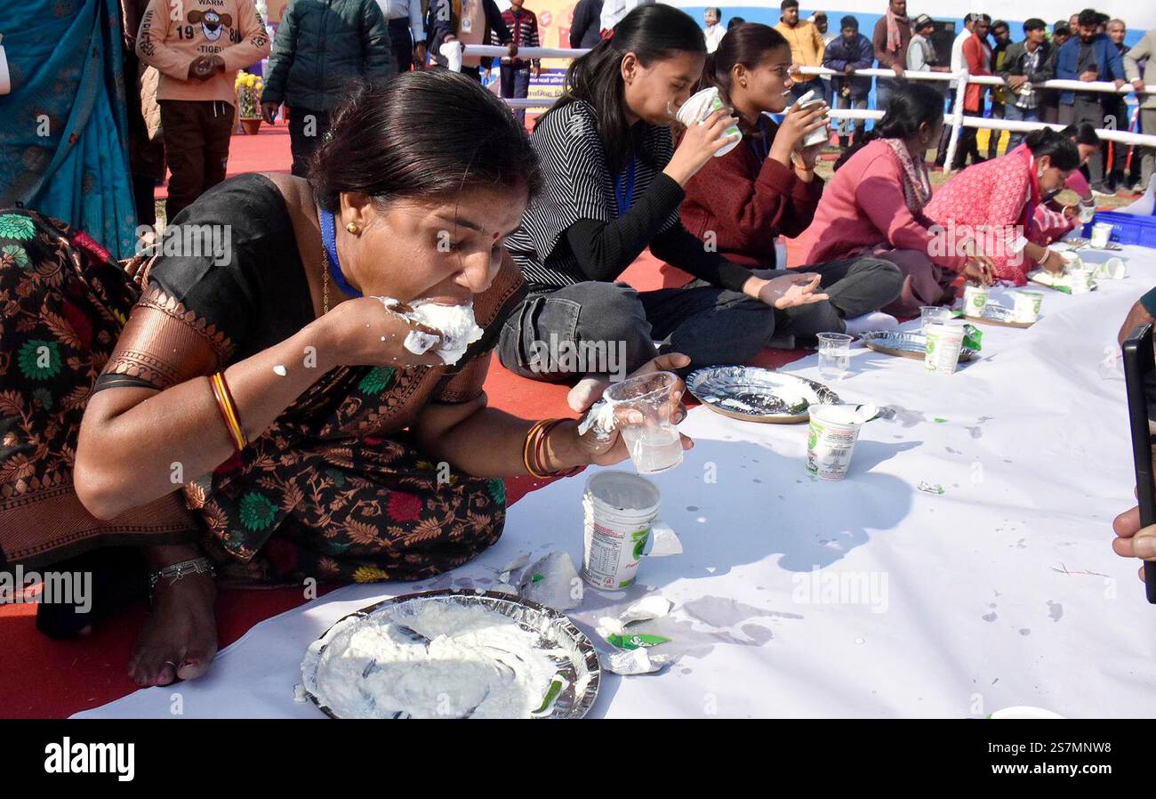 PATNA, INDIA JANUARY 18 Participants eating curd during 'Dahi Khao
