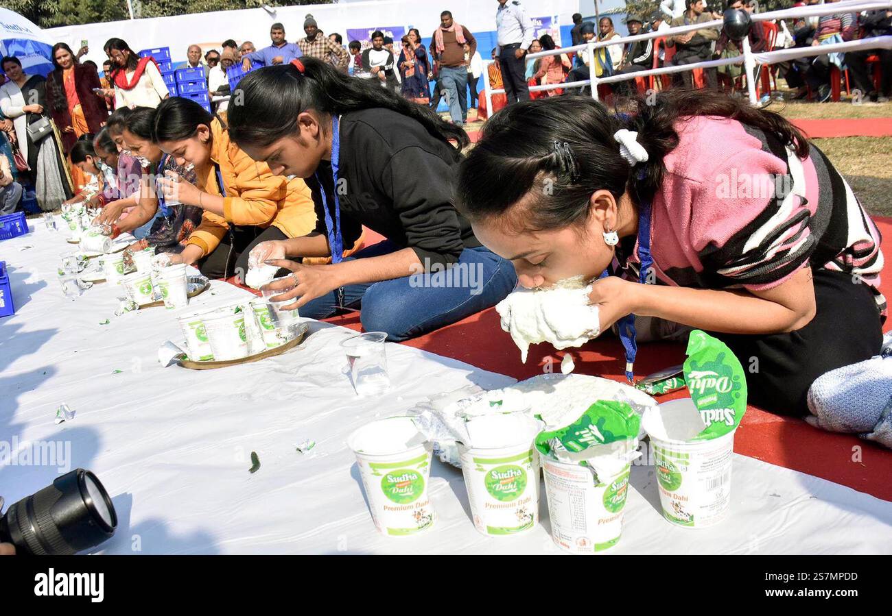 PATNA, INDIA JANUARY 18 Participants eating curd during 'Dahi Khao