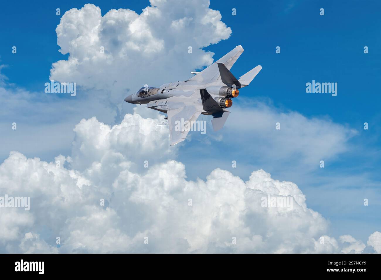 American Fighter Jet Flying Through Dramatic Clouds Stock Photo - Alamy