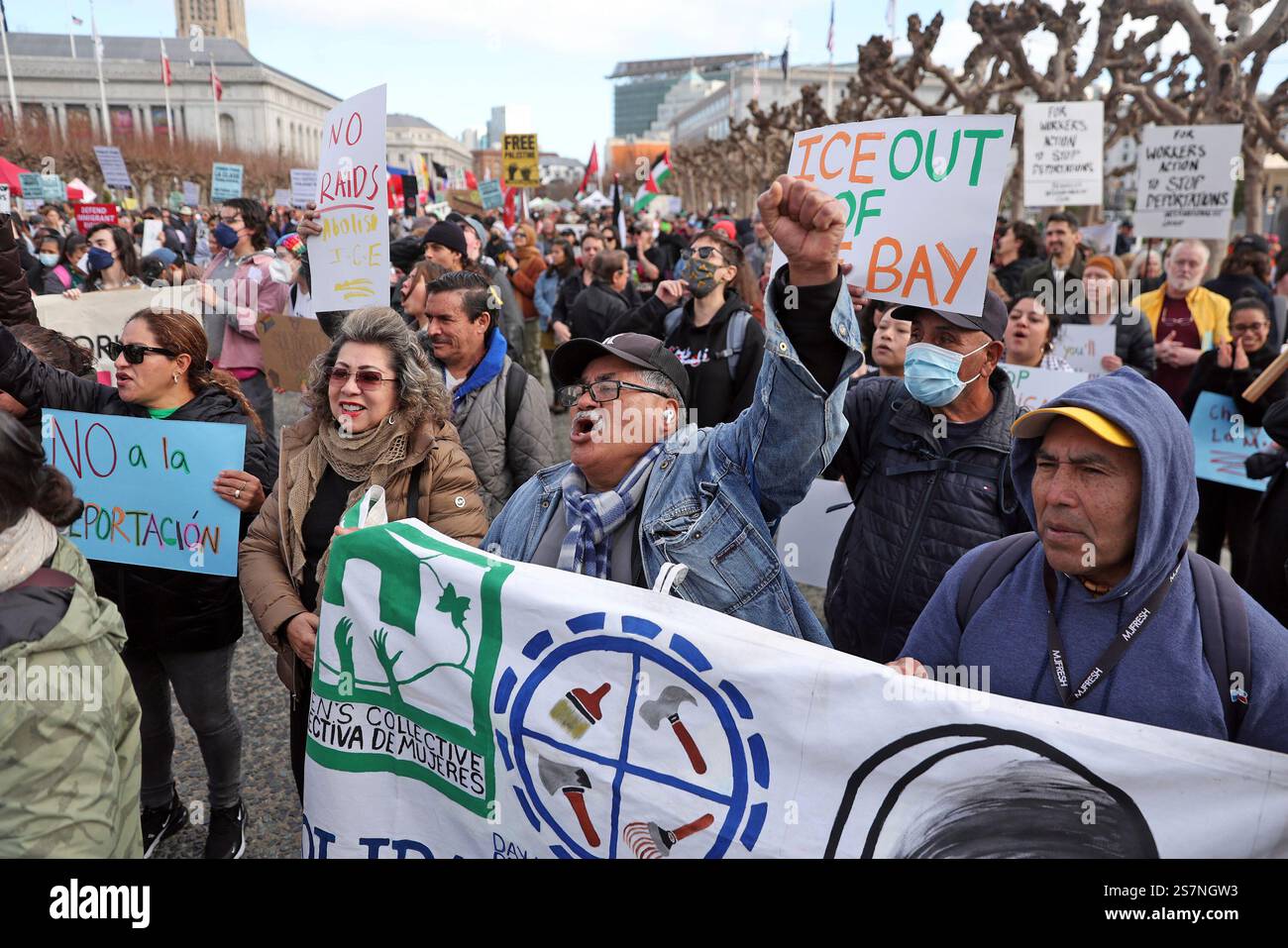 Crowd members cheer a speaker during a rally against President-elect ...