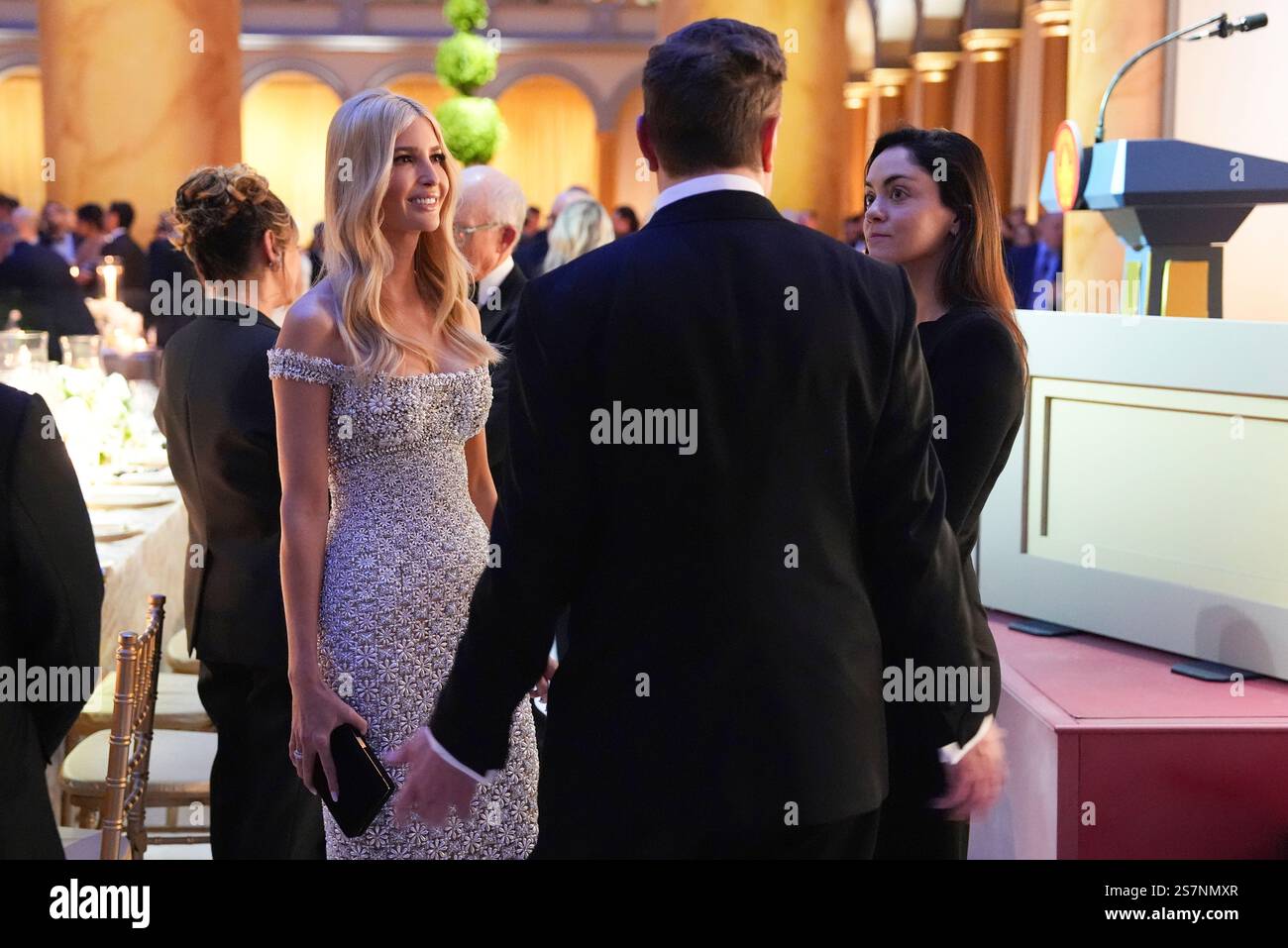 Elon Musk talks with Ivanka Trump and Shivon Zillis, right, before