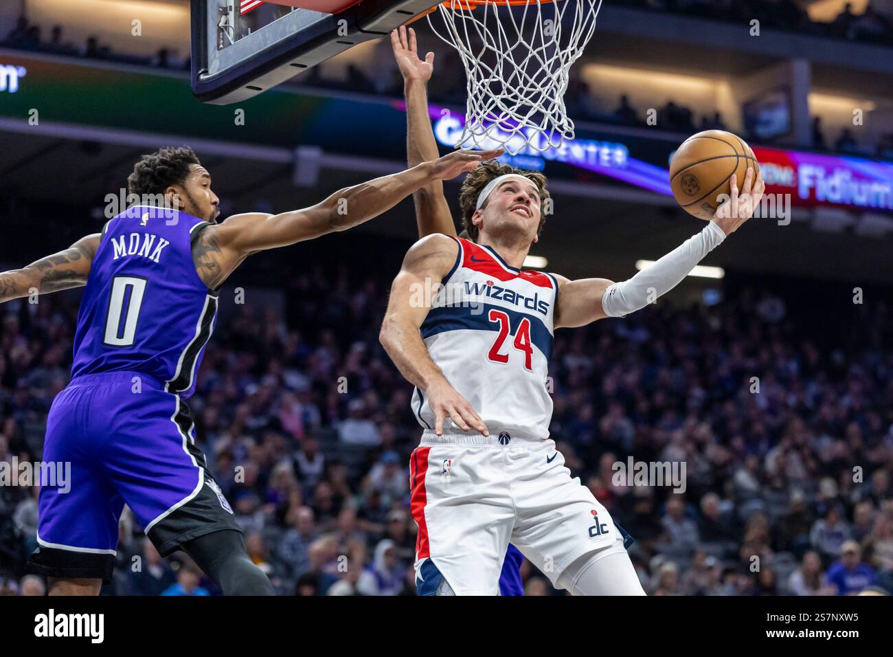 Corey Monk Washington Wizards forward Corey Kispert (24) attempts a reverse layup ...