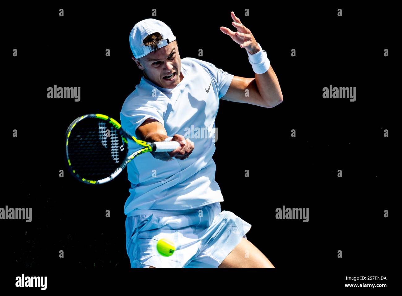 MELBOURNE, VIC - JANUARY 20: Holger Rune of Denmark in action during ...