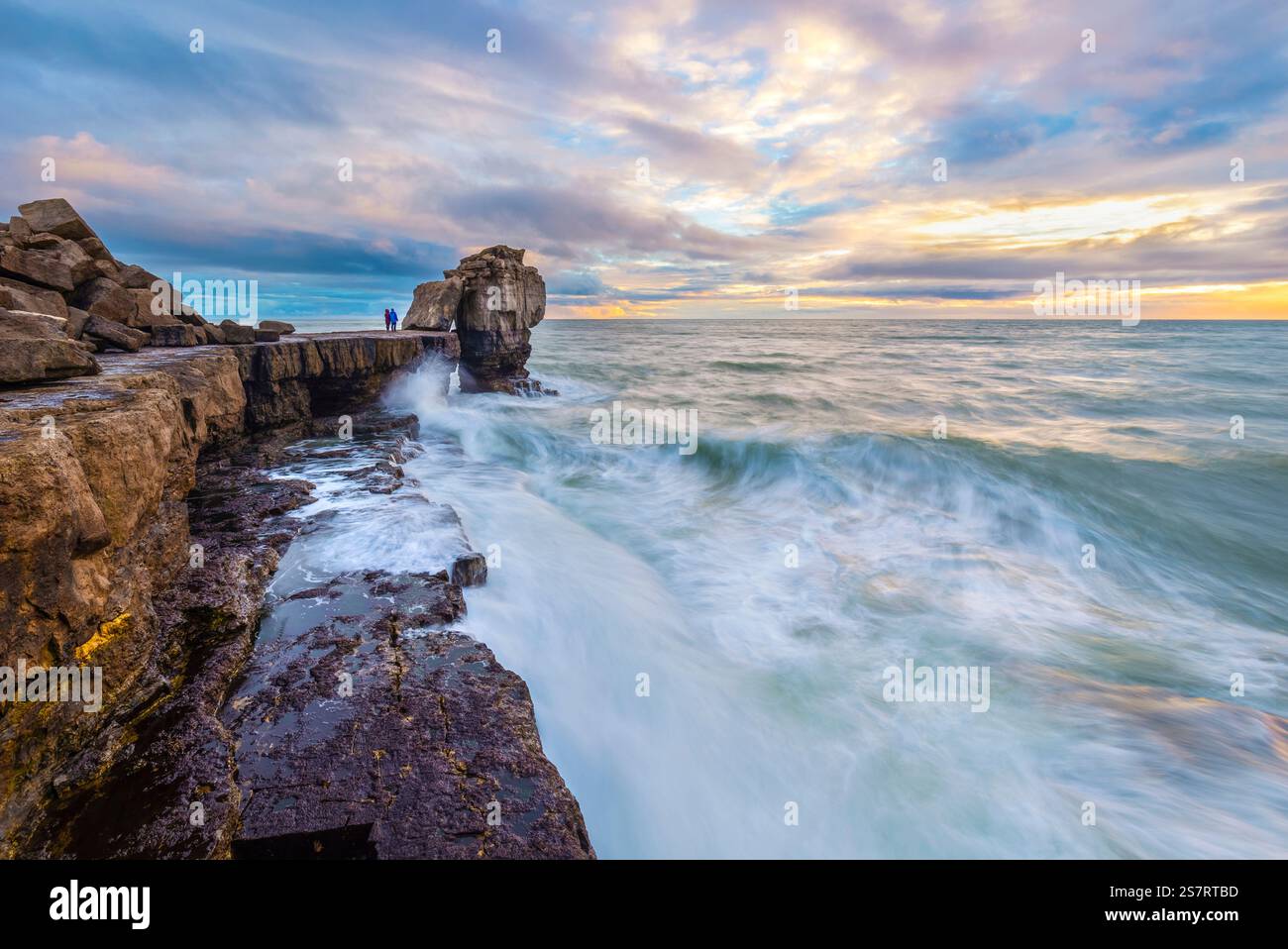 View of the Pulpit Rock at sunset. Isle of Portland, Jurassic coast, Dorset, England, United Kingdom. Stock Photo