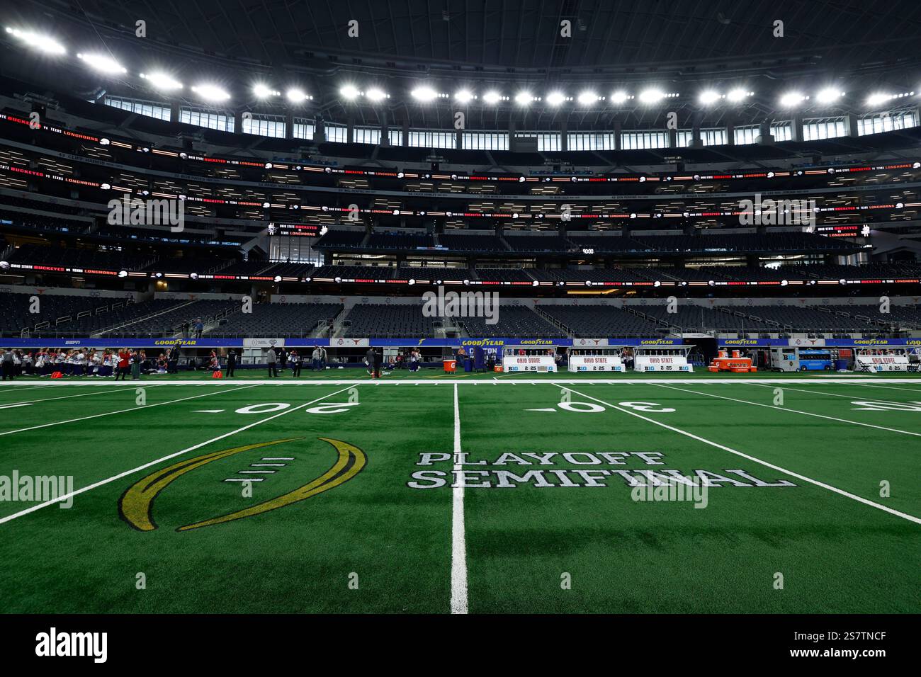 The playoff semifinal logo is seen on the field at AT&T Stadium before