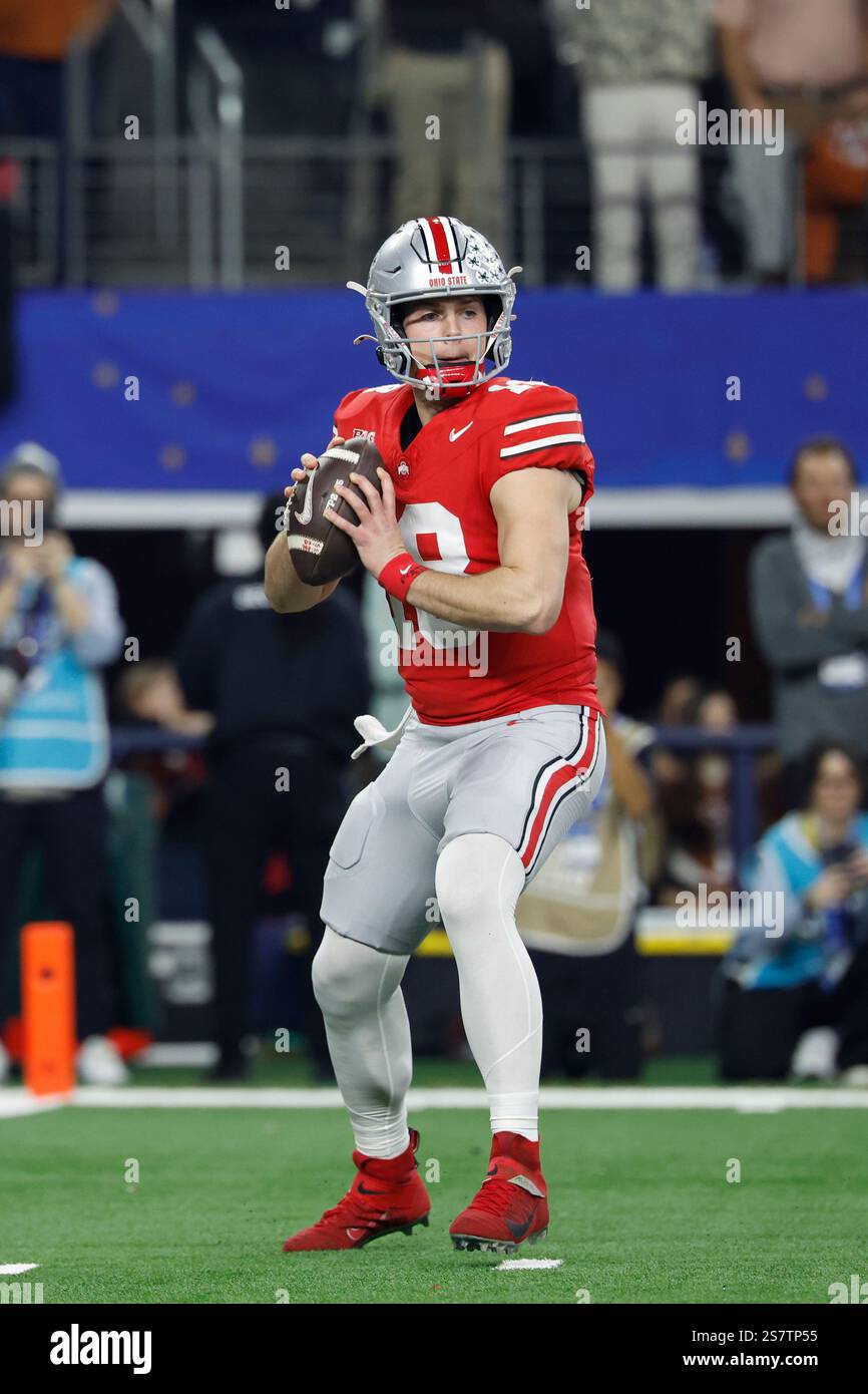 Ohio State quarterback Will Howard (18) looks to pass during the NCAA