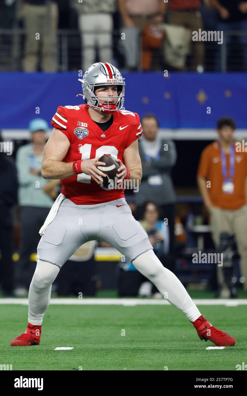 Ohio State quarterback Will Howard (18) looks to pass during the NCAA