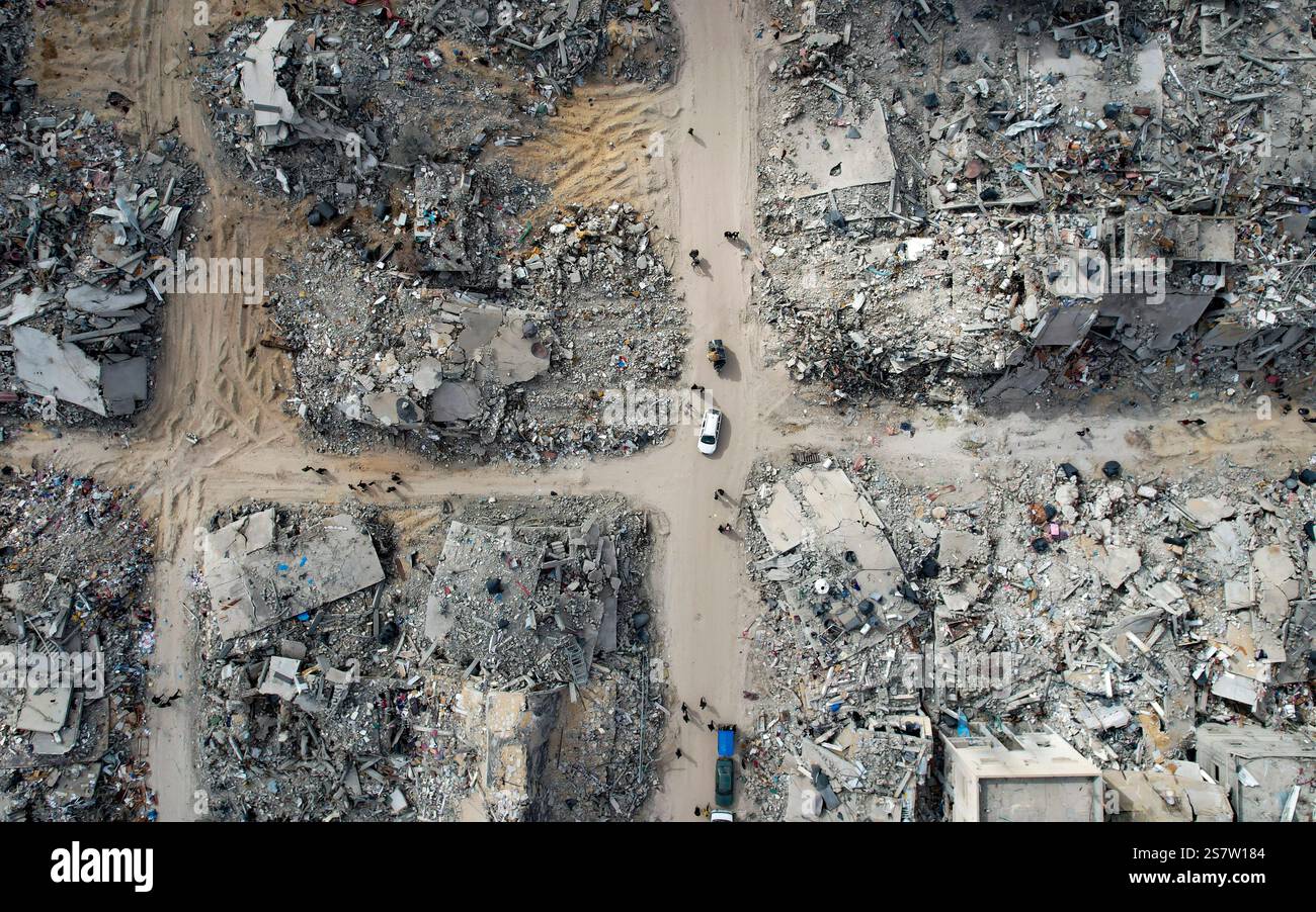 This drone photo shows displaced Palestinians returning to Rafah, a day ...
