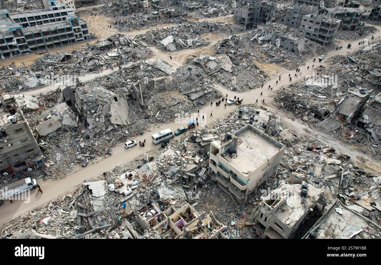 This drone photo shows displaced Palestinians returning to Rafah, a day ...
