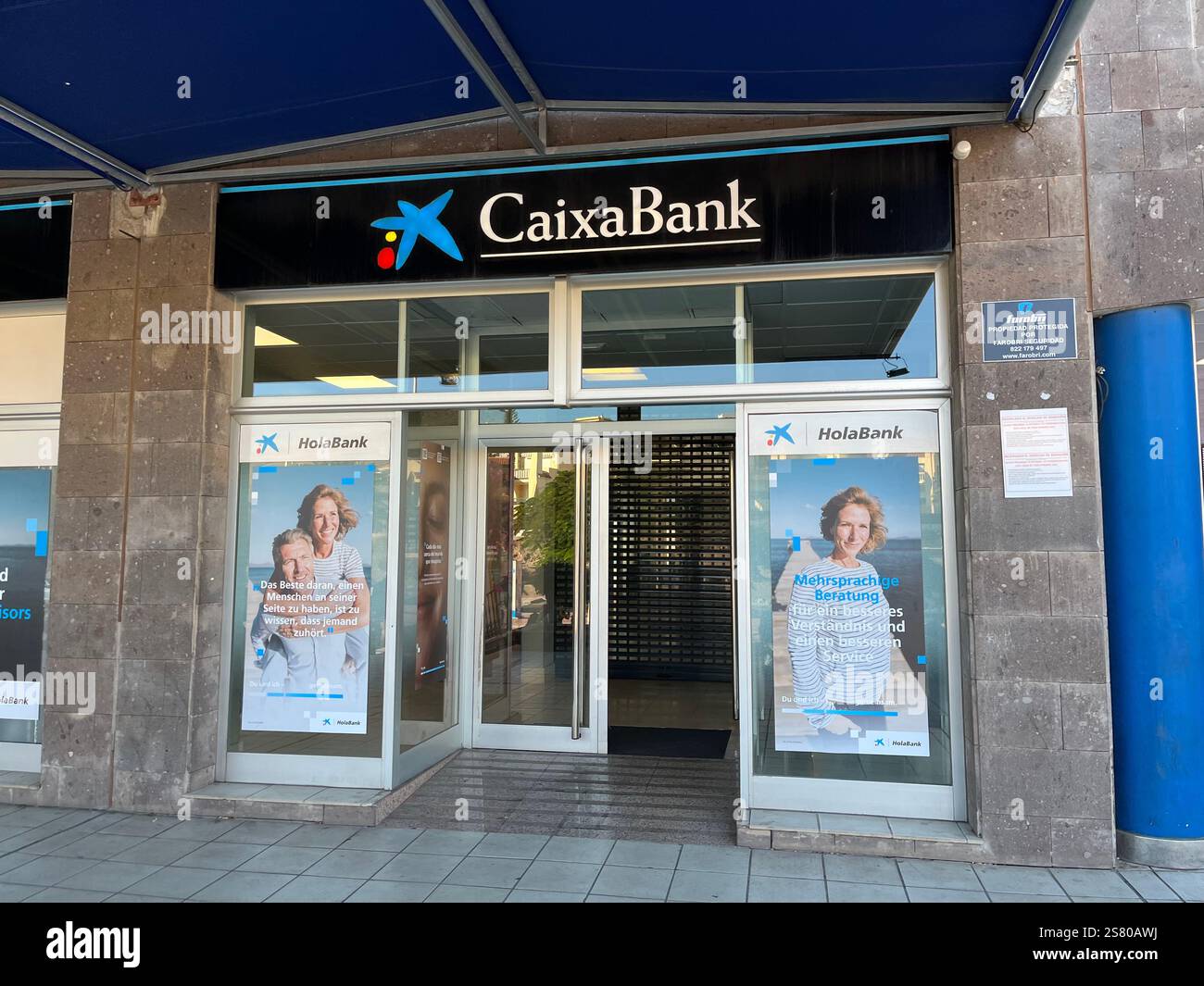 CaixaBank Branch in Costa Adeje. Tenerife, Canary Islands, Spain. 11th January 2025. - Smartphone Captured Stock Image