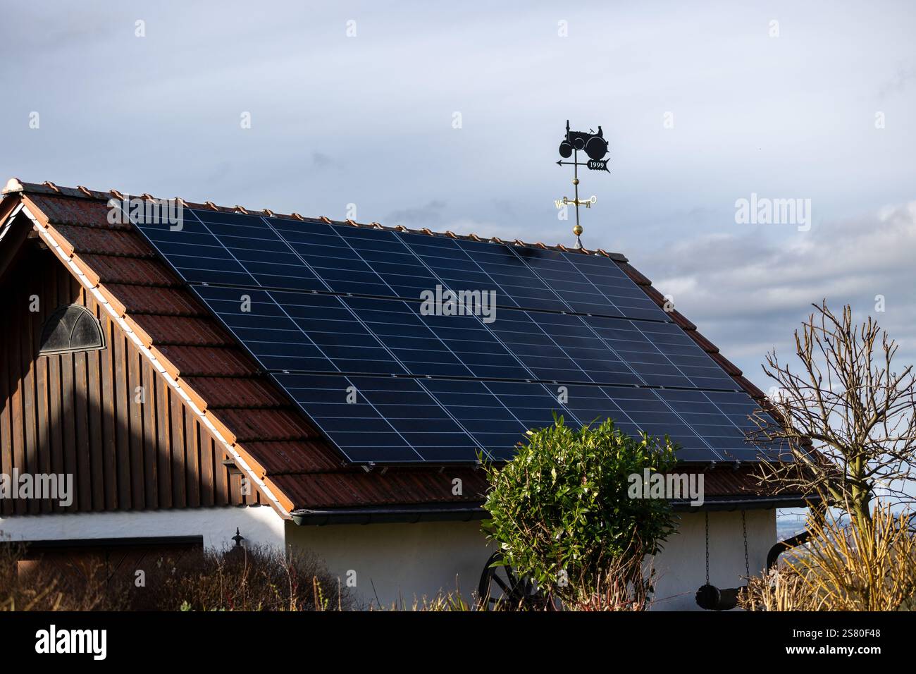 house with built-in solar cells. Alternative energy, resource saving ...