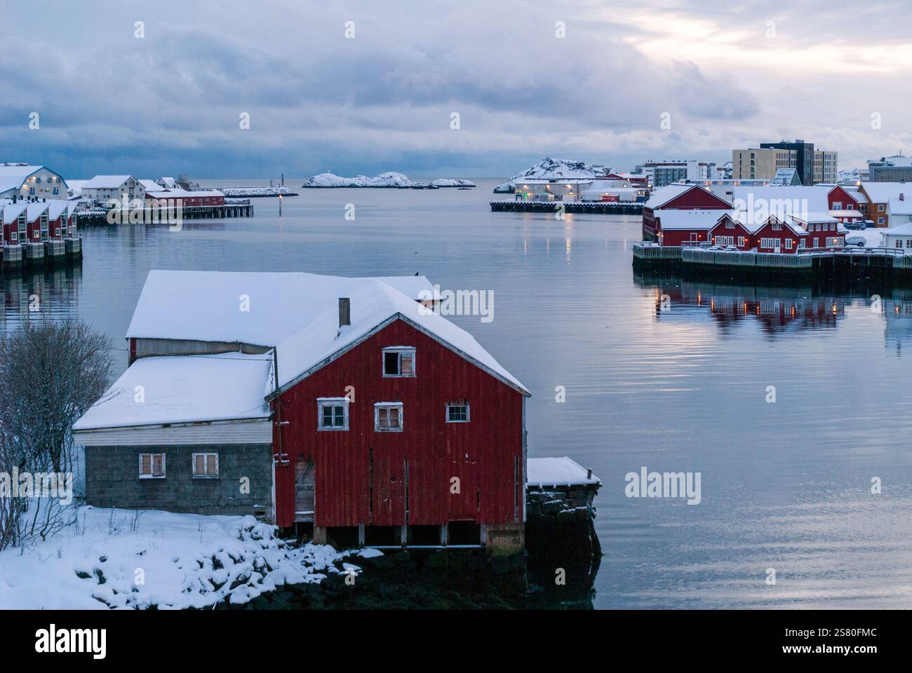 Wonderful winter view of buildings,sea and cloudy sky. Typical nature ...
