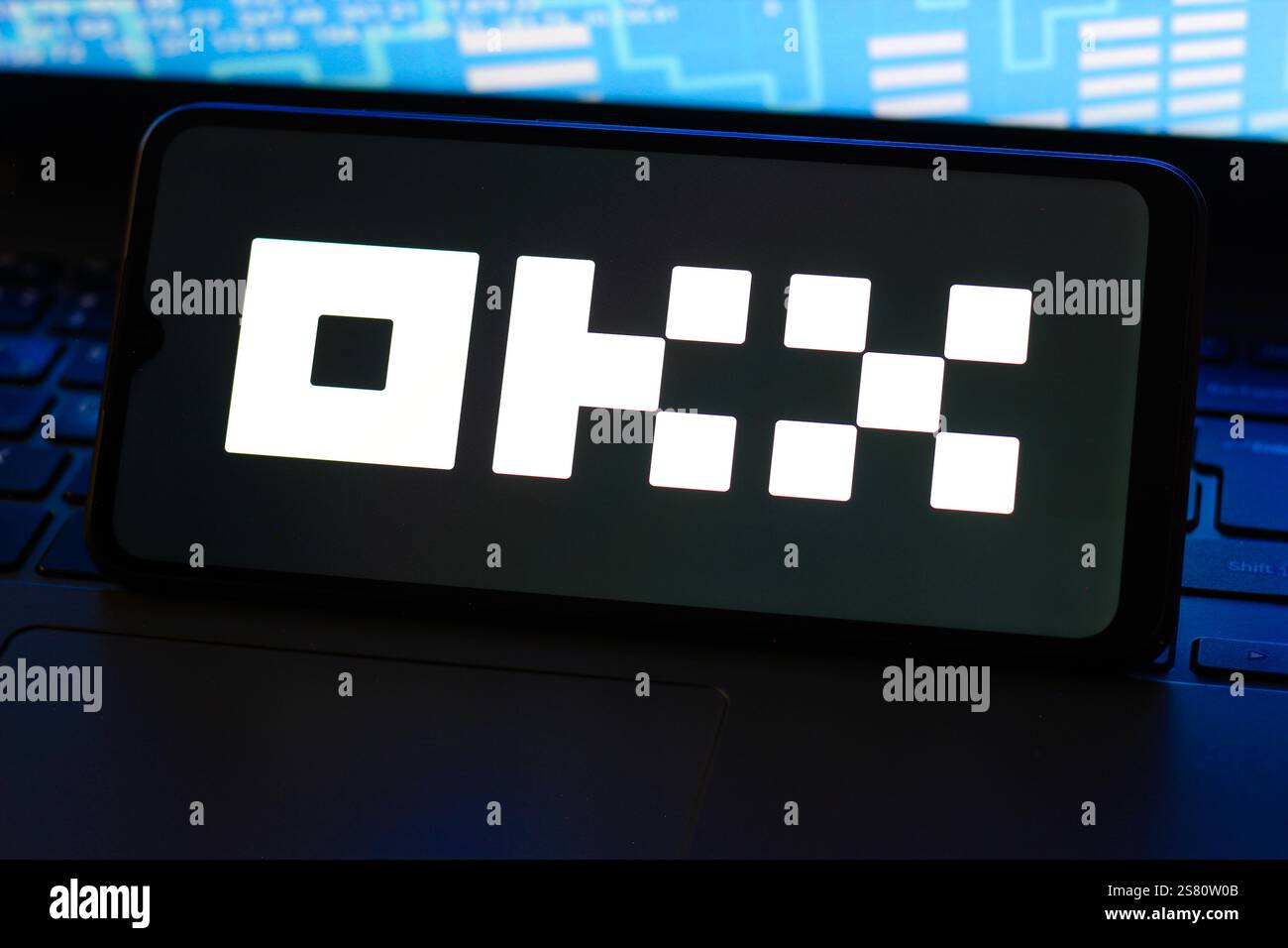 In this photo illustration, the OKX logo is seen displayed on a smartphone screen. Stock Photo