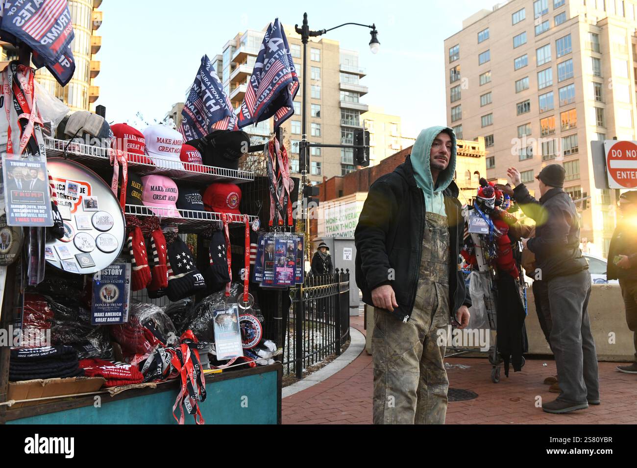 Vendors sell Trump themed merchandise to the crowds lining up outside