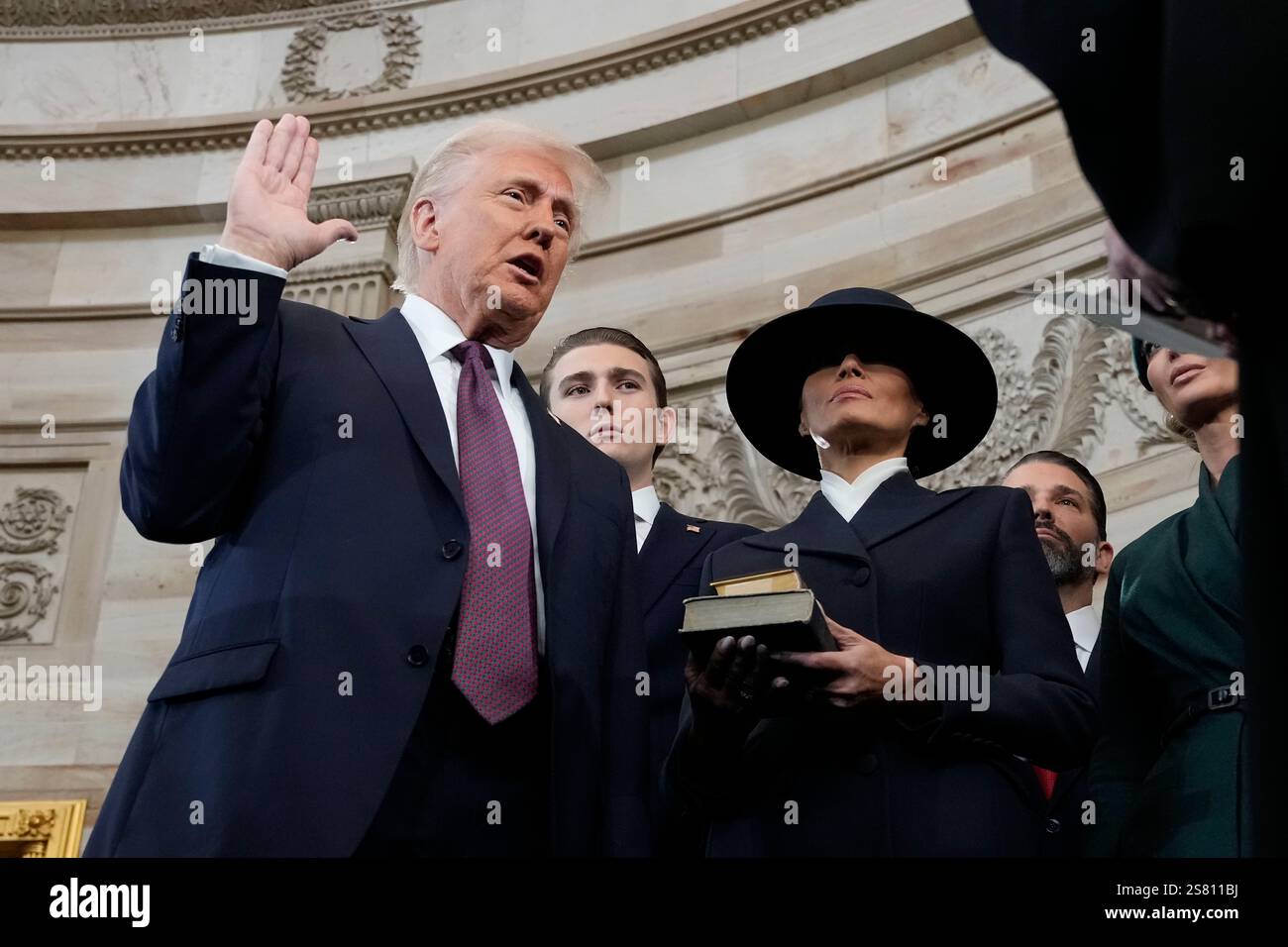 Donald Trump is sworn in as the 47th president of the United States by ...