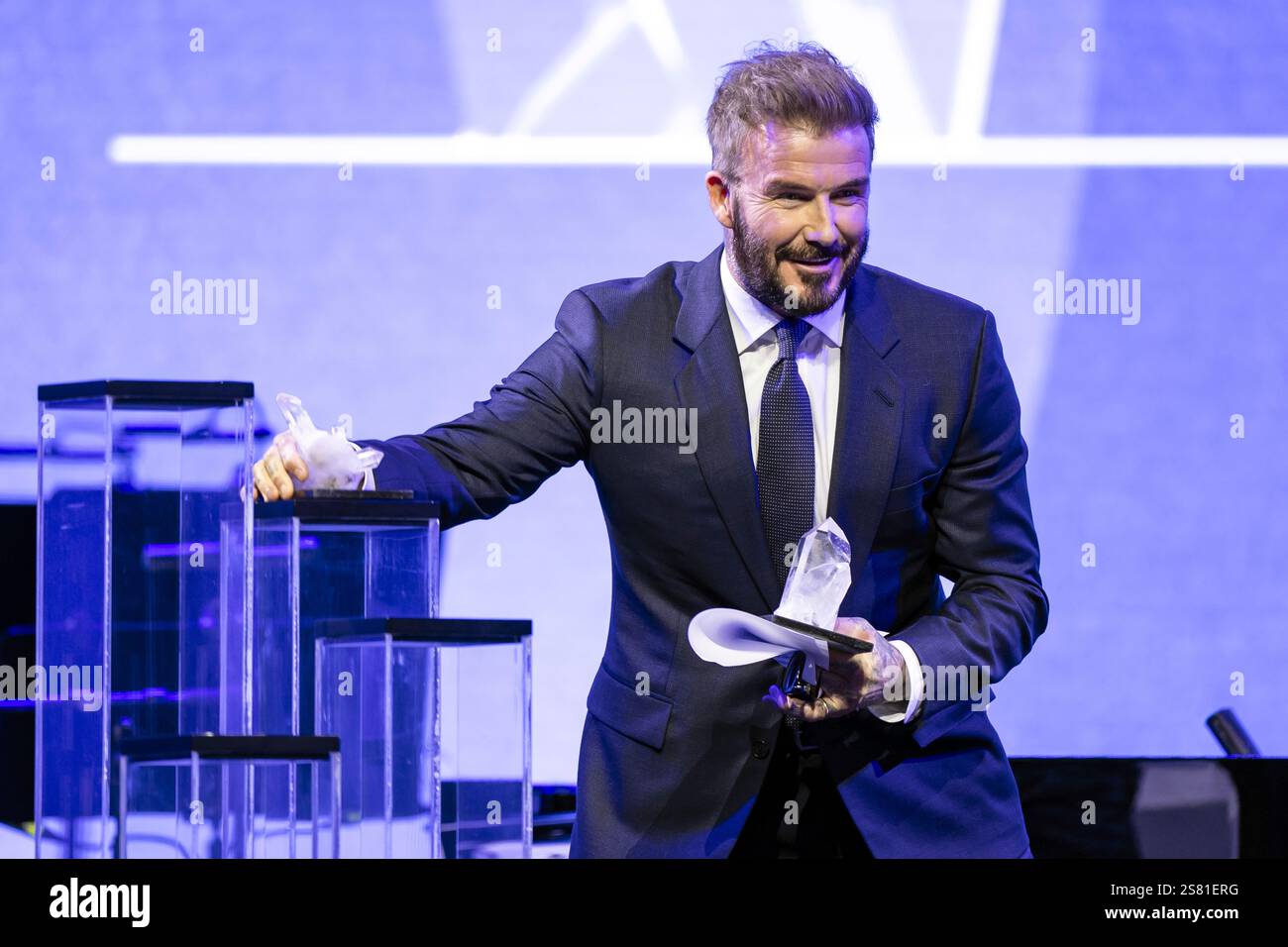 David Beckham receives a Crystal Award, at the 55th annual meeting of