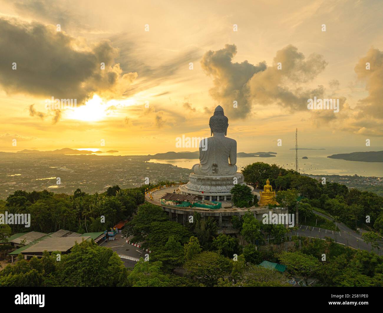 Aerial view flare of sunlight shines through the clouds above the ocean ...