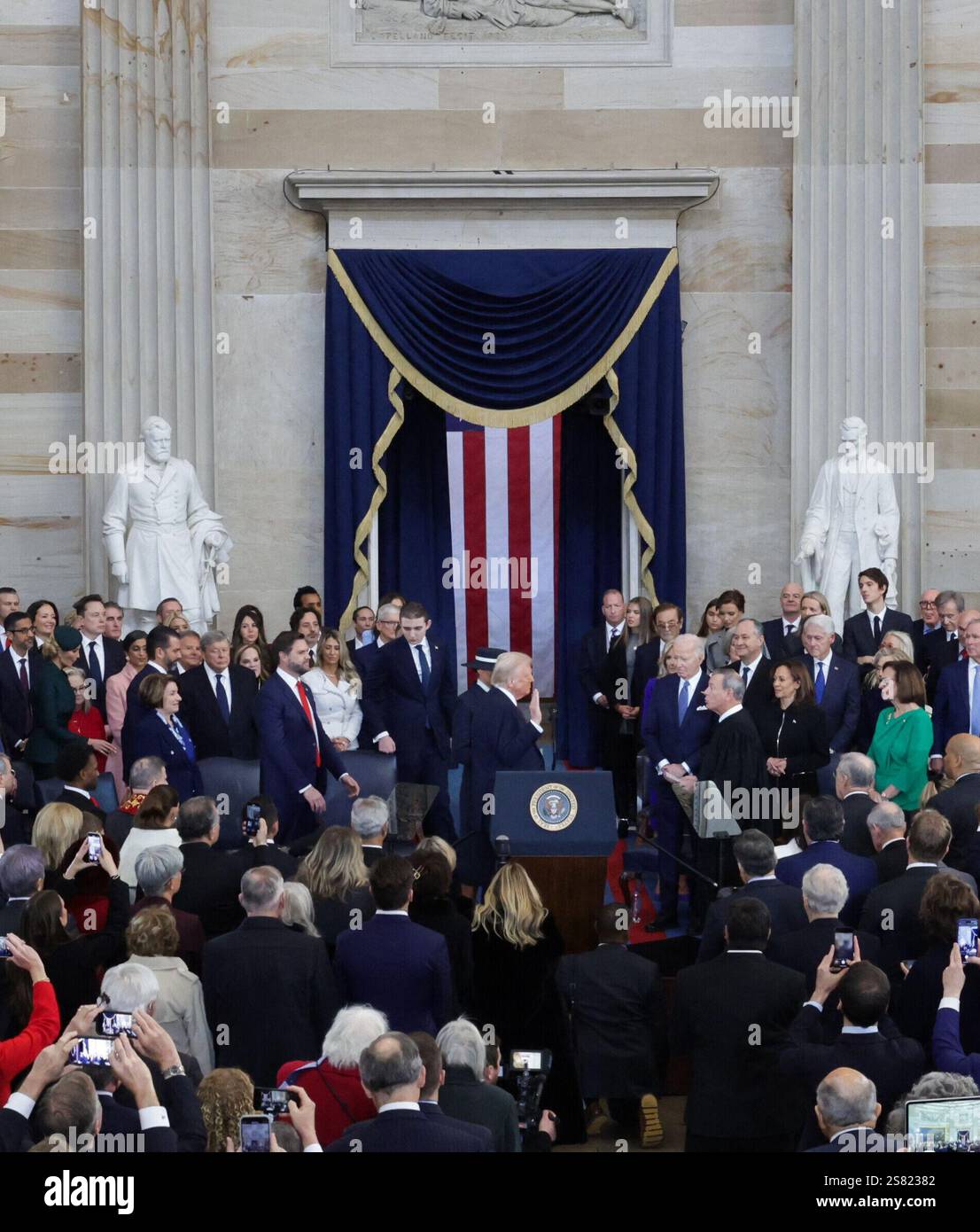 U.S. President Donald Trump takes the oath on the day of his Presidential Inauguration at the