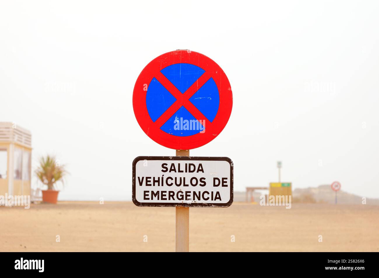 No vehicles except emergency services sign (salida vehiculos de emergencia) in Spanish, Fuerteventura. Taken December 2024. Stock Photo