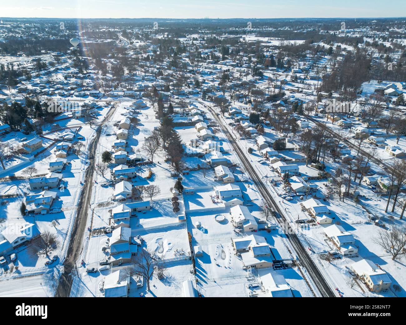 A view of snow covered streets and homes Monday, January 20, 2025 in