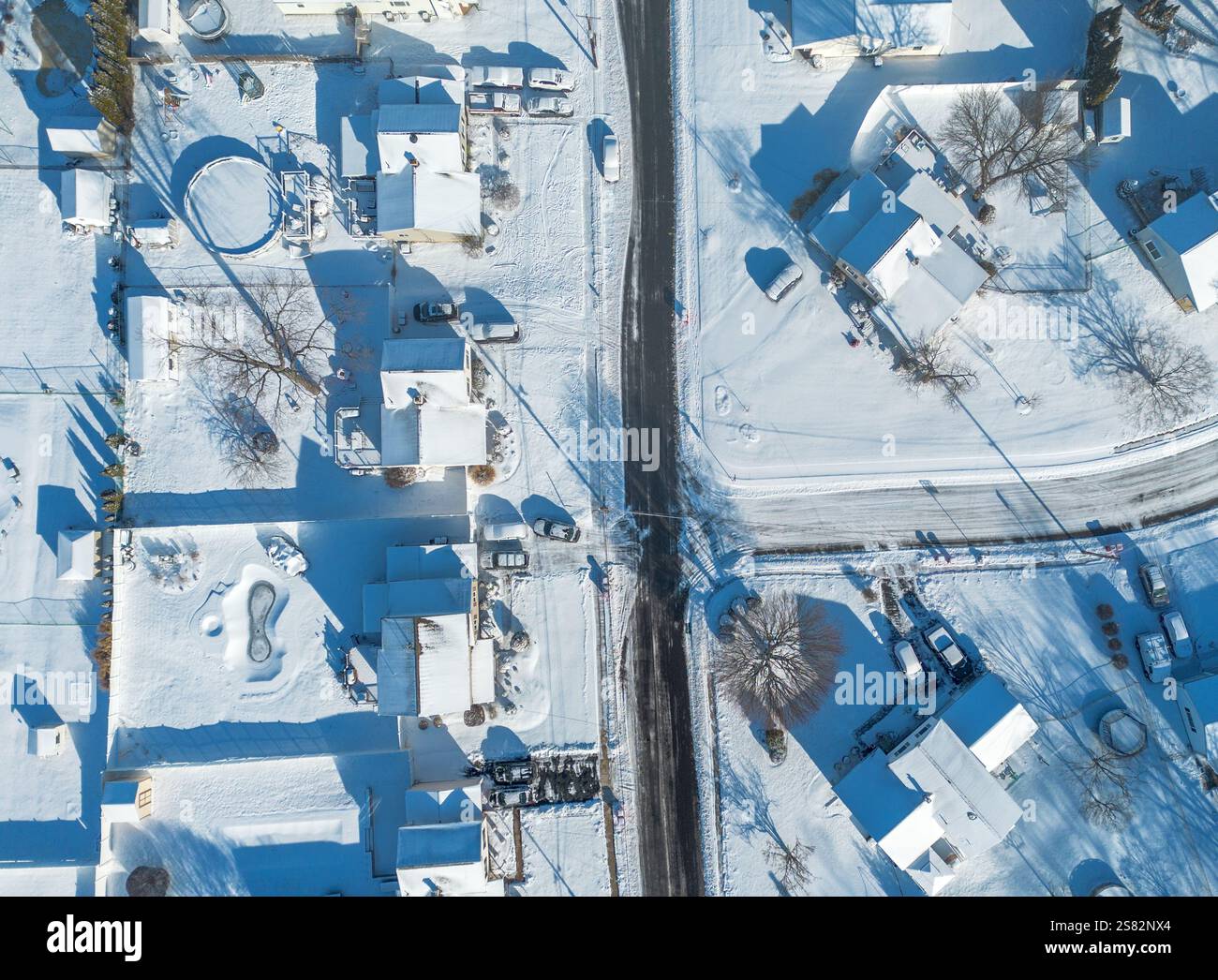 A view of snow covered streets and homes Monday, January 20, 2025 in