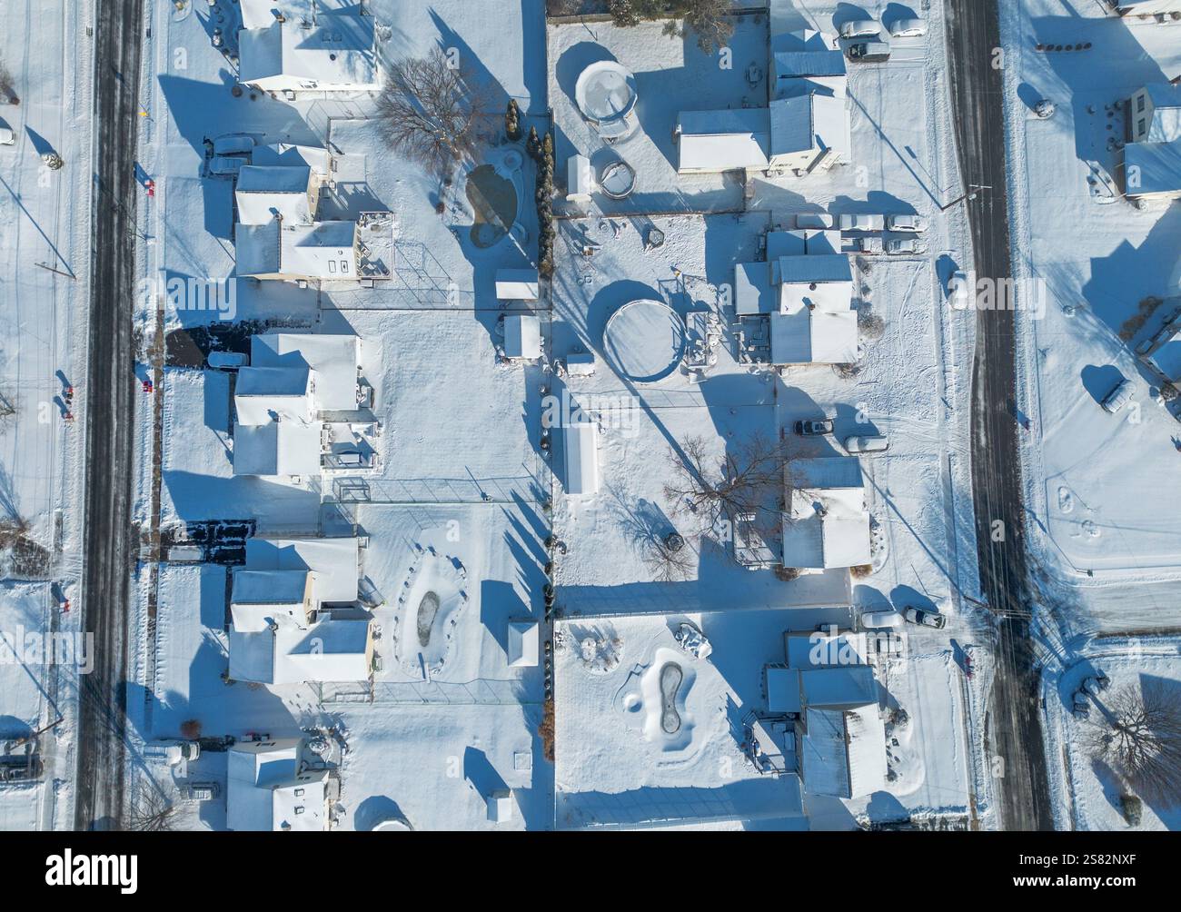 A view of snow covered streets and homes Monday, January 20, 2025 in