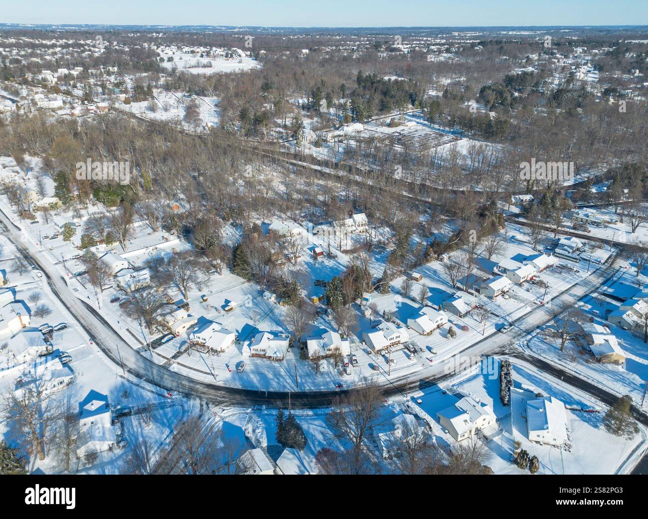 A view of snow covered streets and homes Monday, January 20, 2025 in