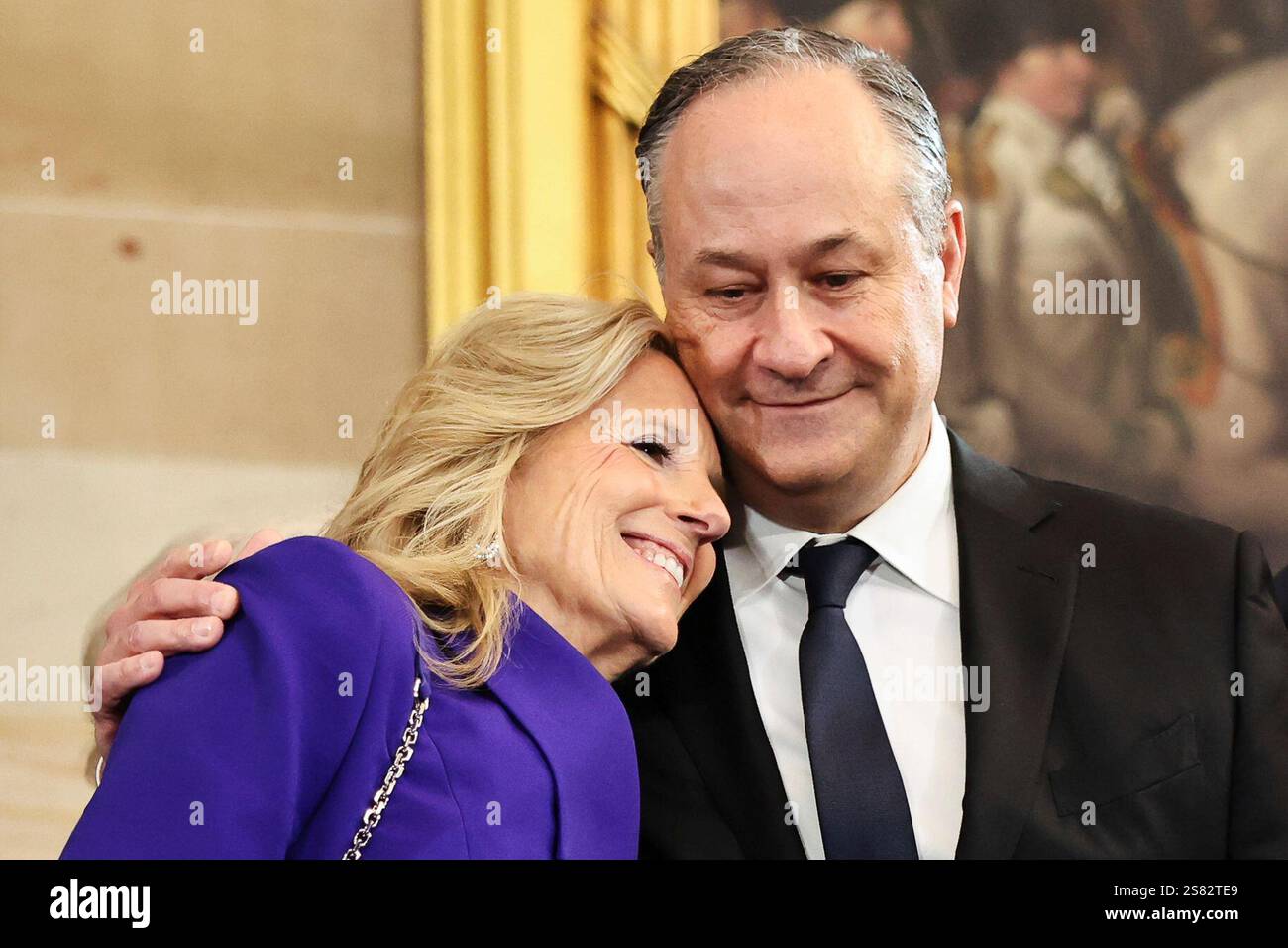 First lady Jill Biden hugs second gentleman Doug Emhoff as they arrive ...