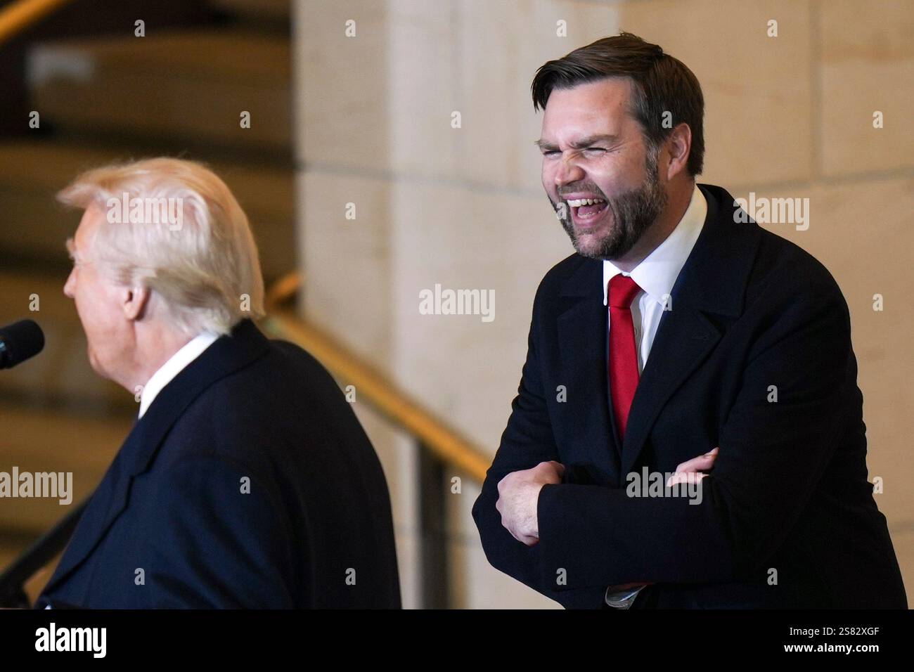 Vice President JD Vance laughs as President Donald Trump speaks in ...