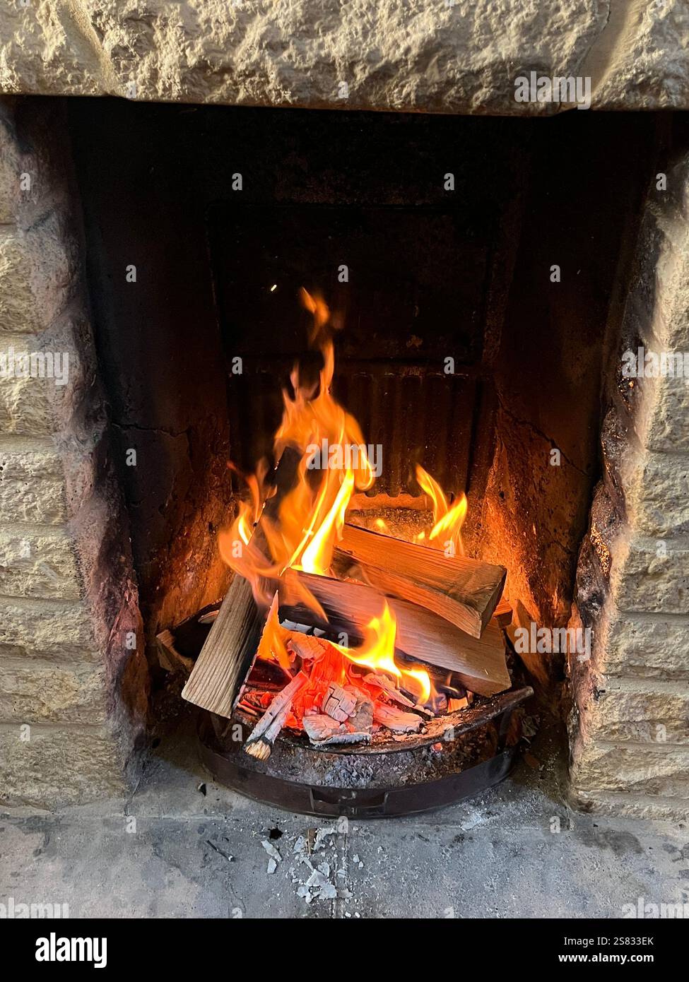 Open Fire Burning in House - Smartphone Captured Stock Image