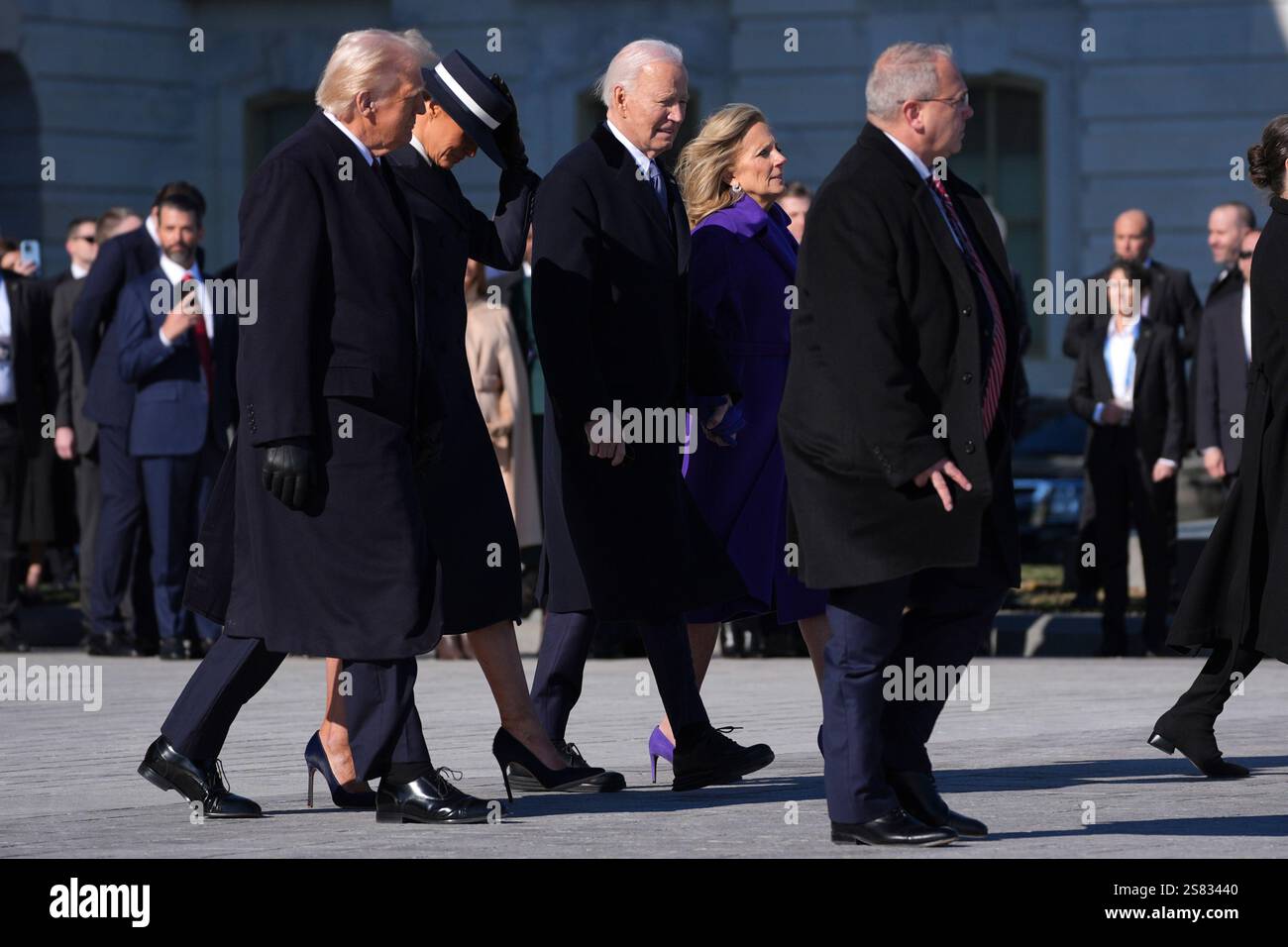 President Donald Trump, from left, and first lady Melania Trump, walk ...
