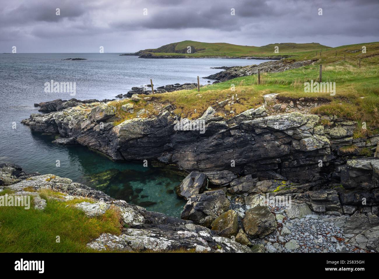 Meal Beach is one of the most popular beaches on Shetland due to it's pure white sands, Azure blue waters and breathtaking coastline. Stock Photo