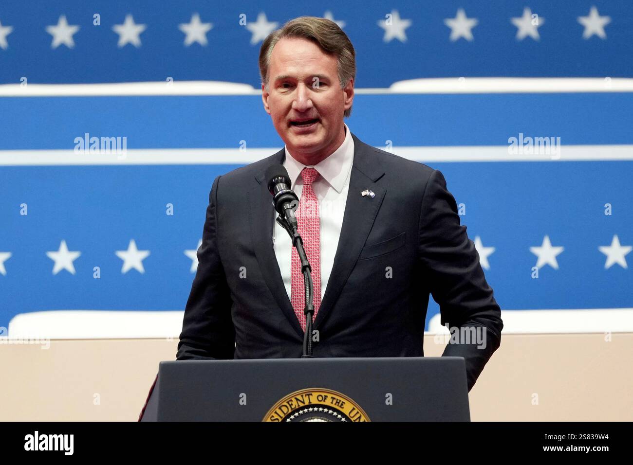 Virginia Gov. Glenn Youngkin speaks at an indoor Presidential