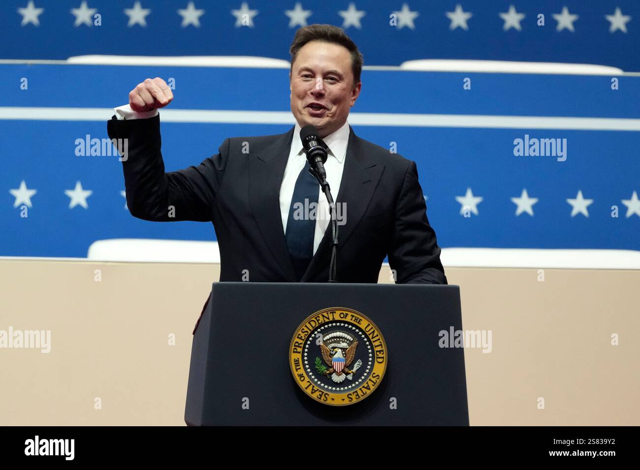 Elon Musk speaks at an indoor Presidential Inauguration parade event in