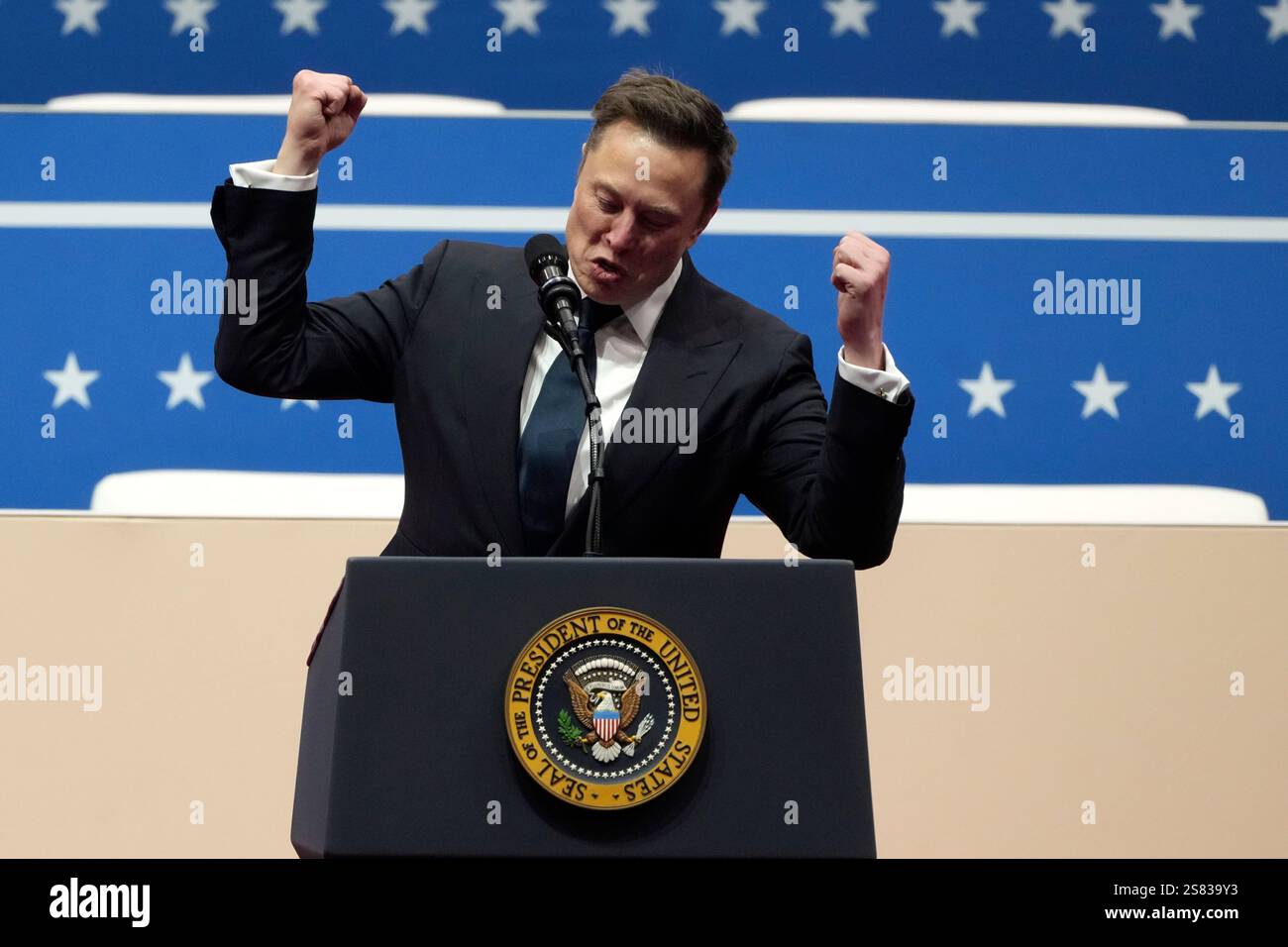 Elon Musk speaks at an indoor Presidential Inauguration parade event in