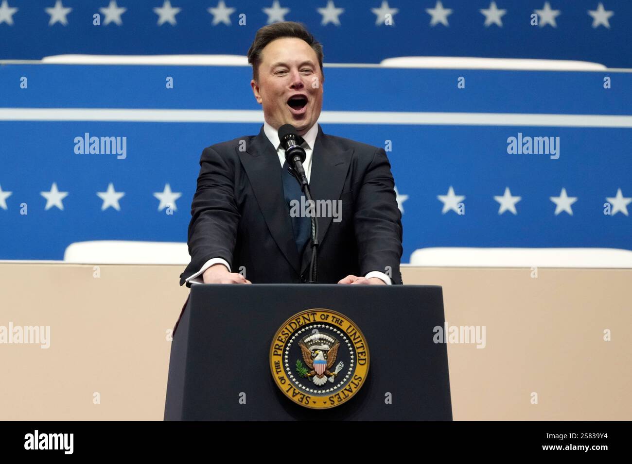 Elon Musk speaks at an indoor Presidential Inauguration parade event in