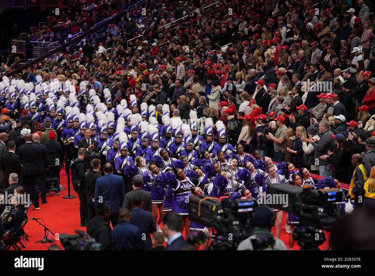 Students from Middletown High School in Ohio march at an indoor