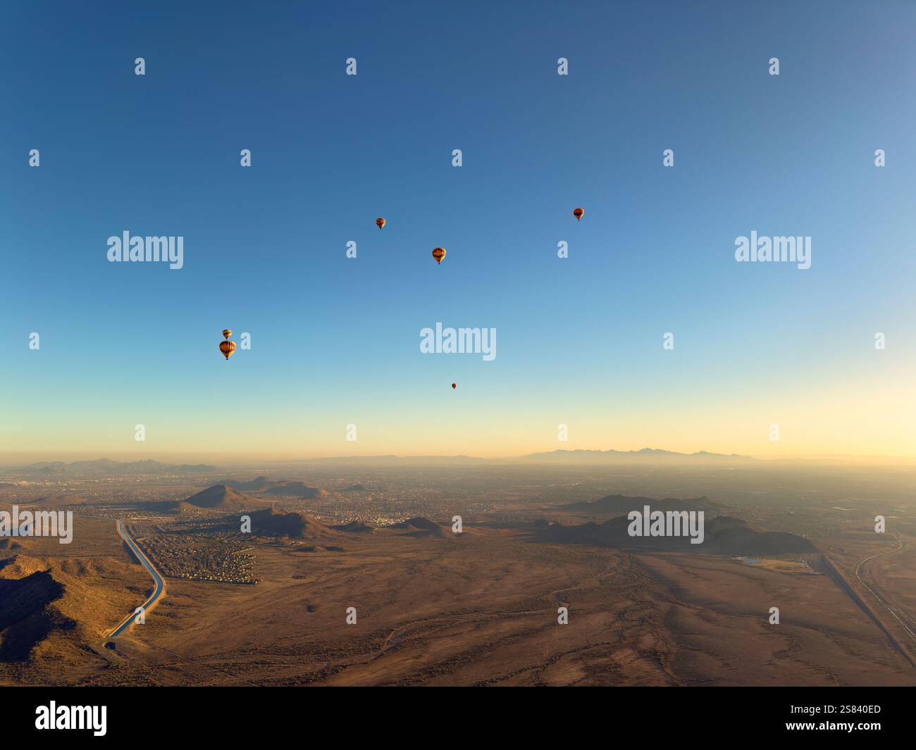 Aerial view from several hot air balloons in flight showing panoramic view of Phoenix Arizona during winter season Stock Photo