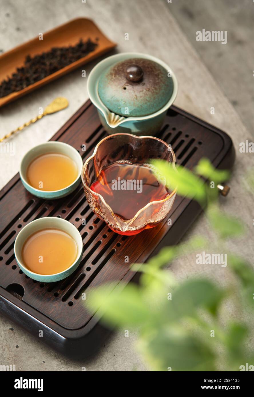 Still Tea Still life photo of ceramic Gaiwan, clear glass pitcher, tea cups with ...